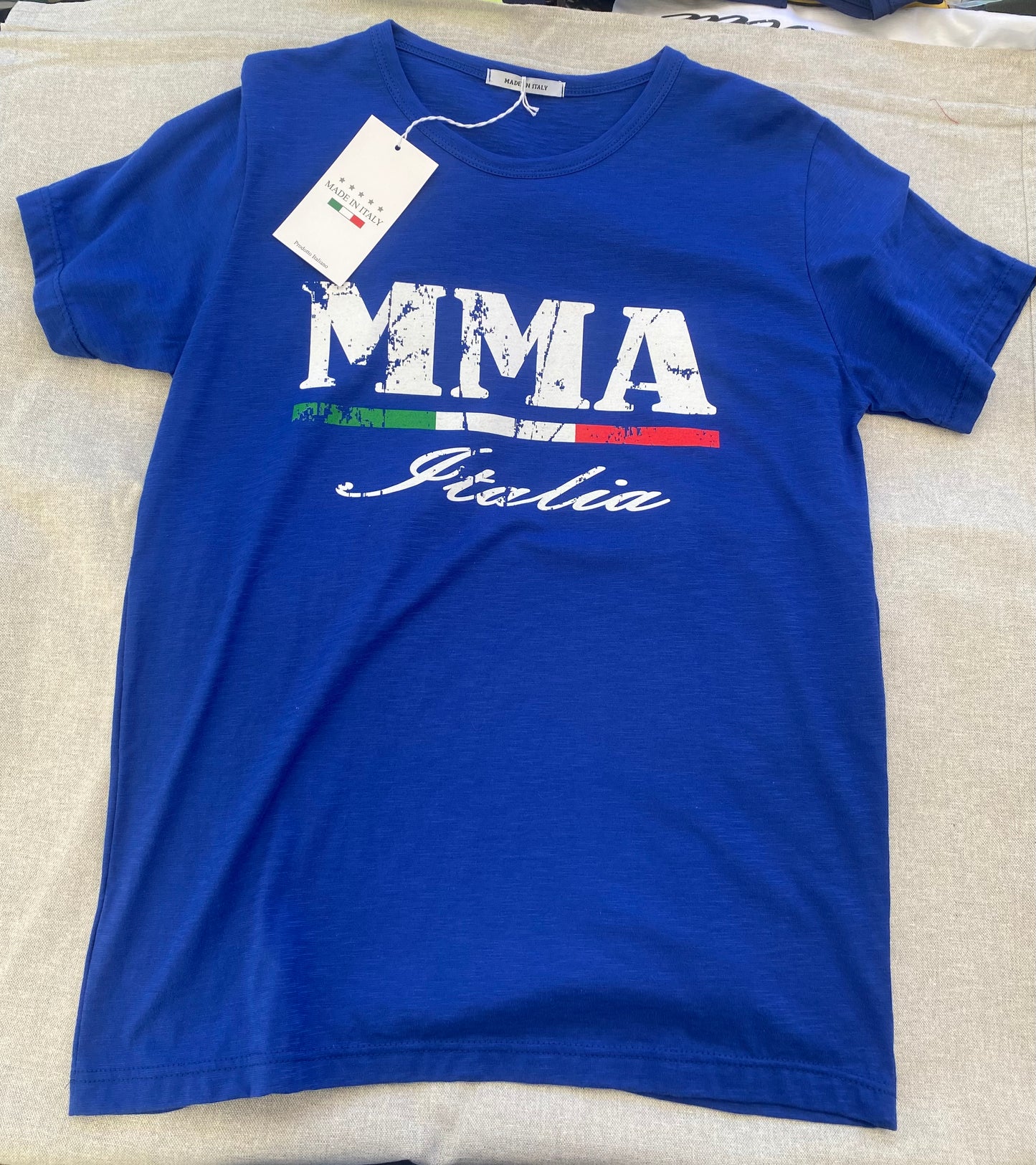 maglietta cottone fiammato manica corta blu avio dispiegata